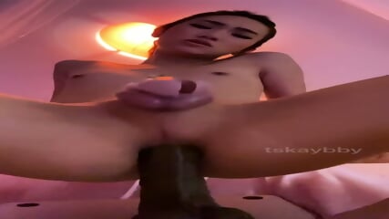 Asian Sissy in Chastity Plays with Big Black Dildo